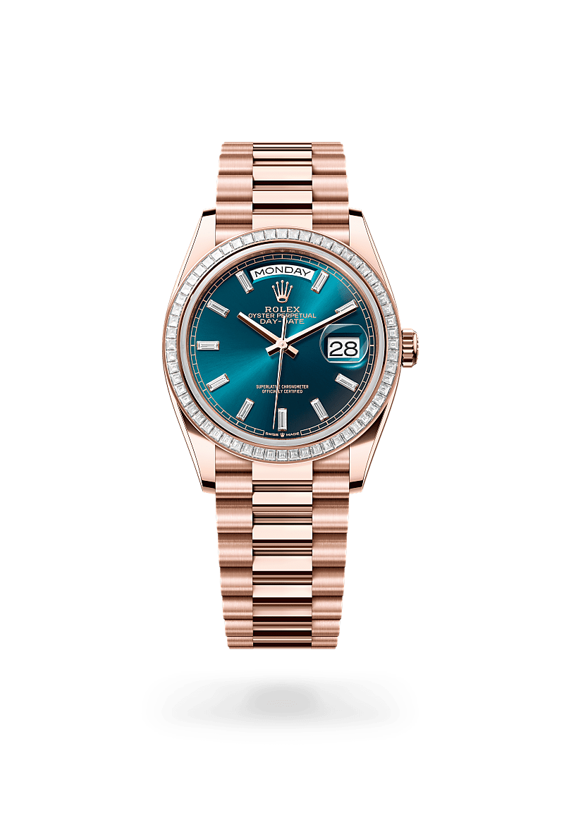Rolex Day-Date 36 in Oyster, 36 mm, Everose gold and diamonds with a Blue-green set with diamonds dial, Set with diamonds bezel, and President, semi-circular three-piece links bracelet