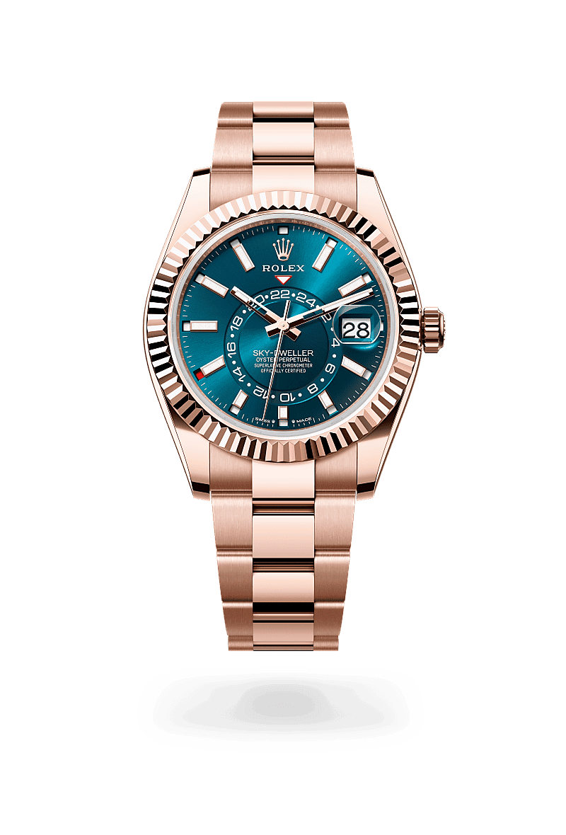 Rolex Sky-Dweller in Oyster, 42 mm, Everose gold with a Blue-green dial, Fluted, bidirectional rotatable Rolex Ring Command bezel, and Oyster, three-piece solid links bracelet