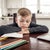 Glum school boy stuck at home (Credit: Shutterstock)