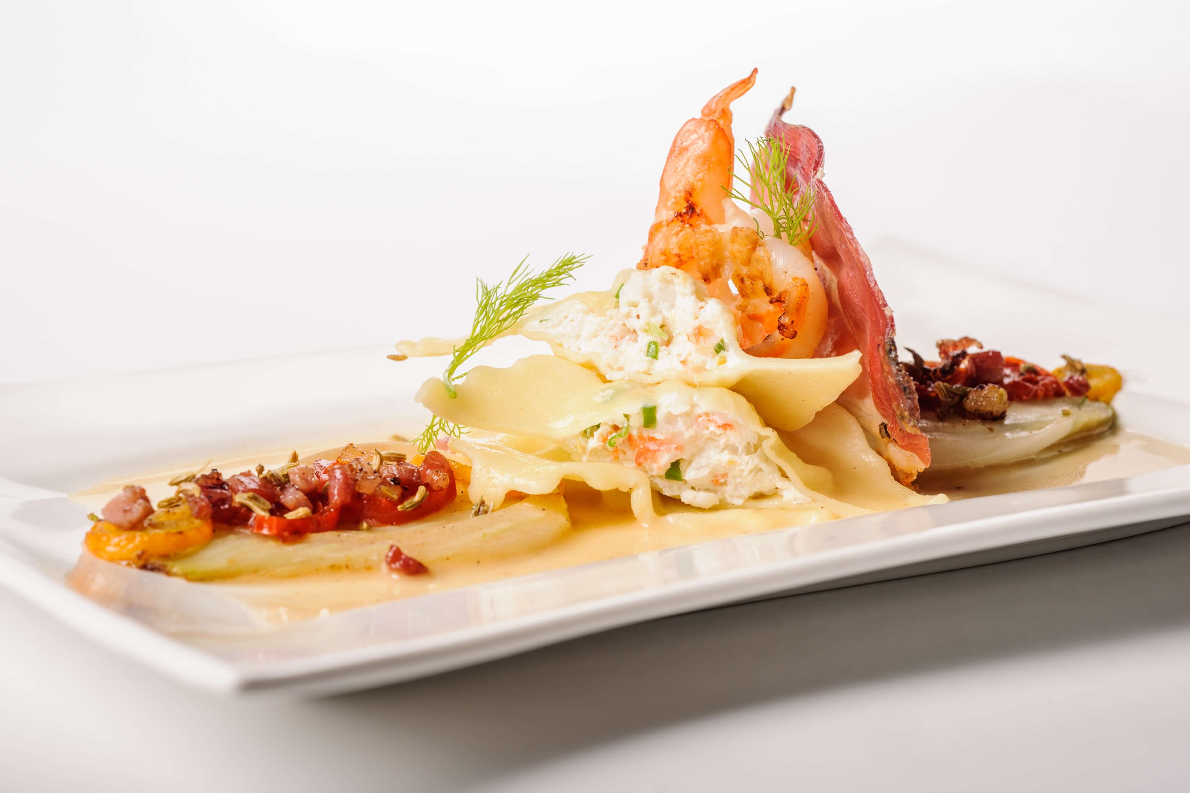 Ravioli with prawns and Speck Alto Adige PGI