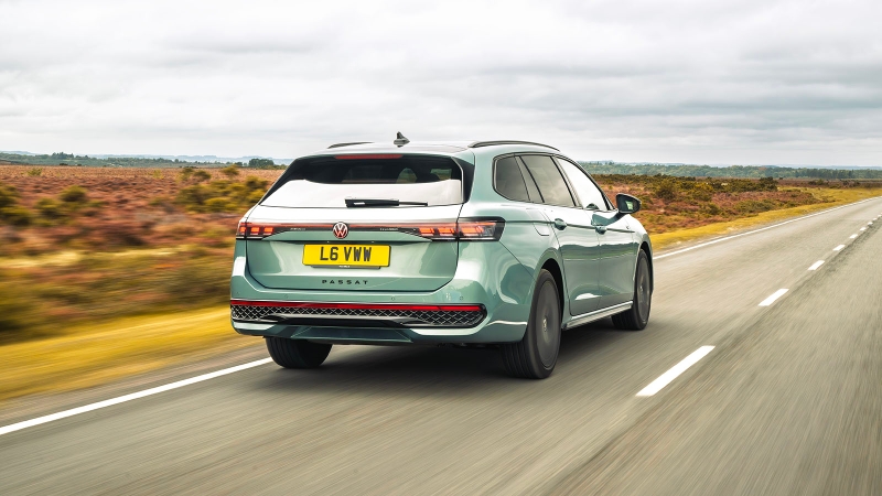 Volkswagen Passat Estate in green, rear three quarter