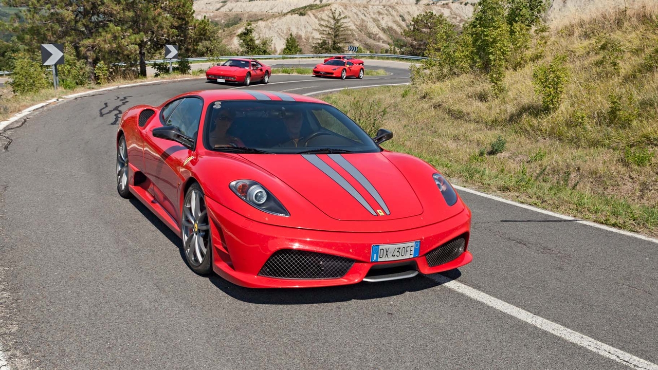 Trio of Ferraris on an Italian road
