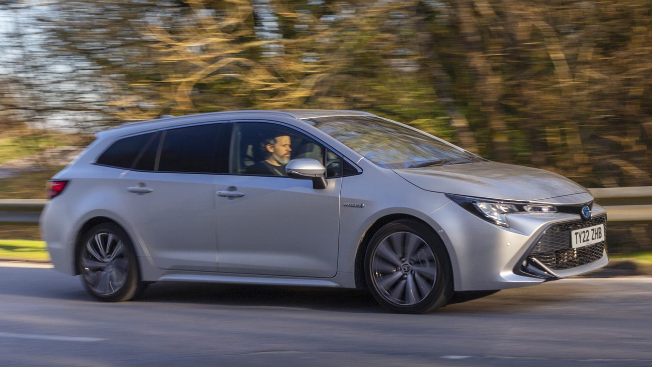 Toyota Corolla Touring Sport in silver, driving shot