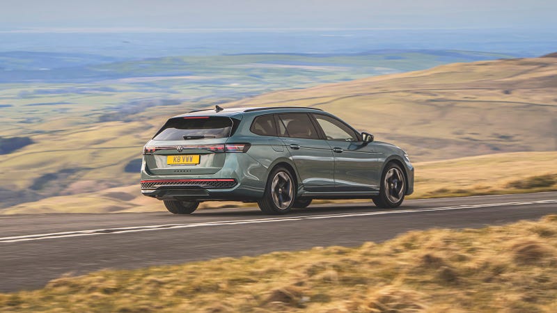 Volkswagen Passat Estate in green, rear three quarter