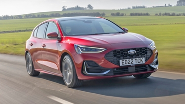 Ford Focus driving in red