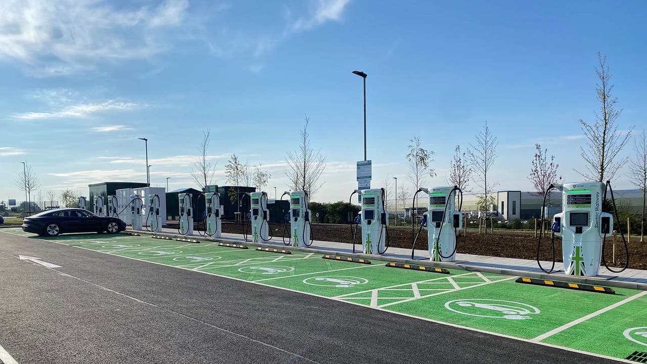 A row of EV charging points in a public car park.