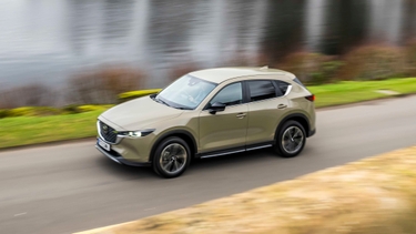 Mazda CX-5 driving front/side view
