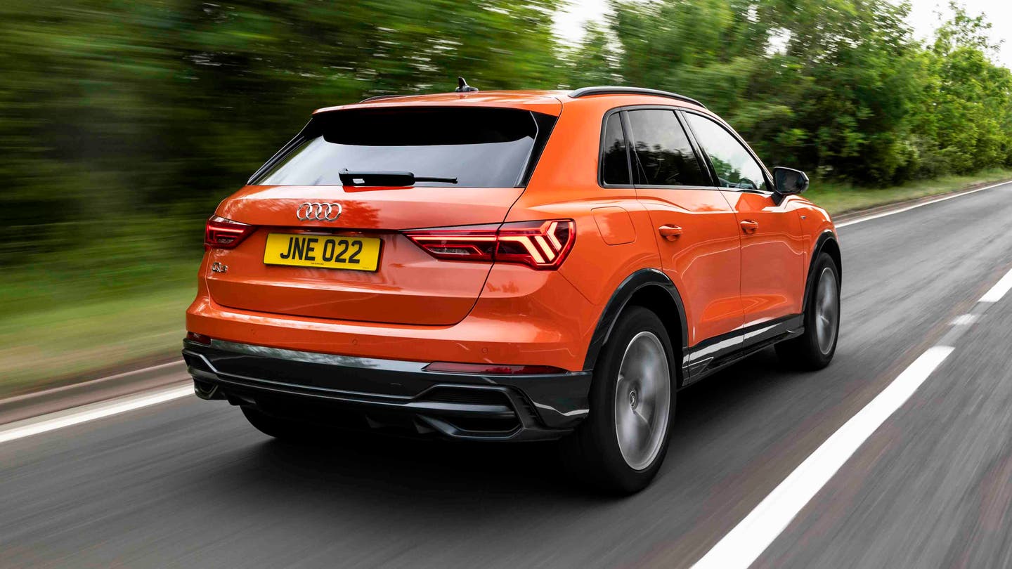 Audi Q3 driving rear view