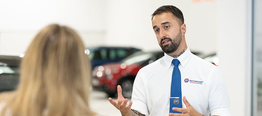 Motorpoint salesperson talking to customer