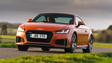 Audi TT driving around corner