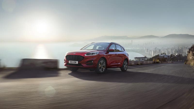 Ford Kuga in red driving shot