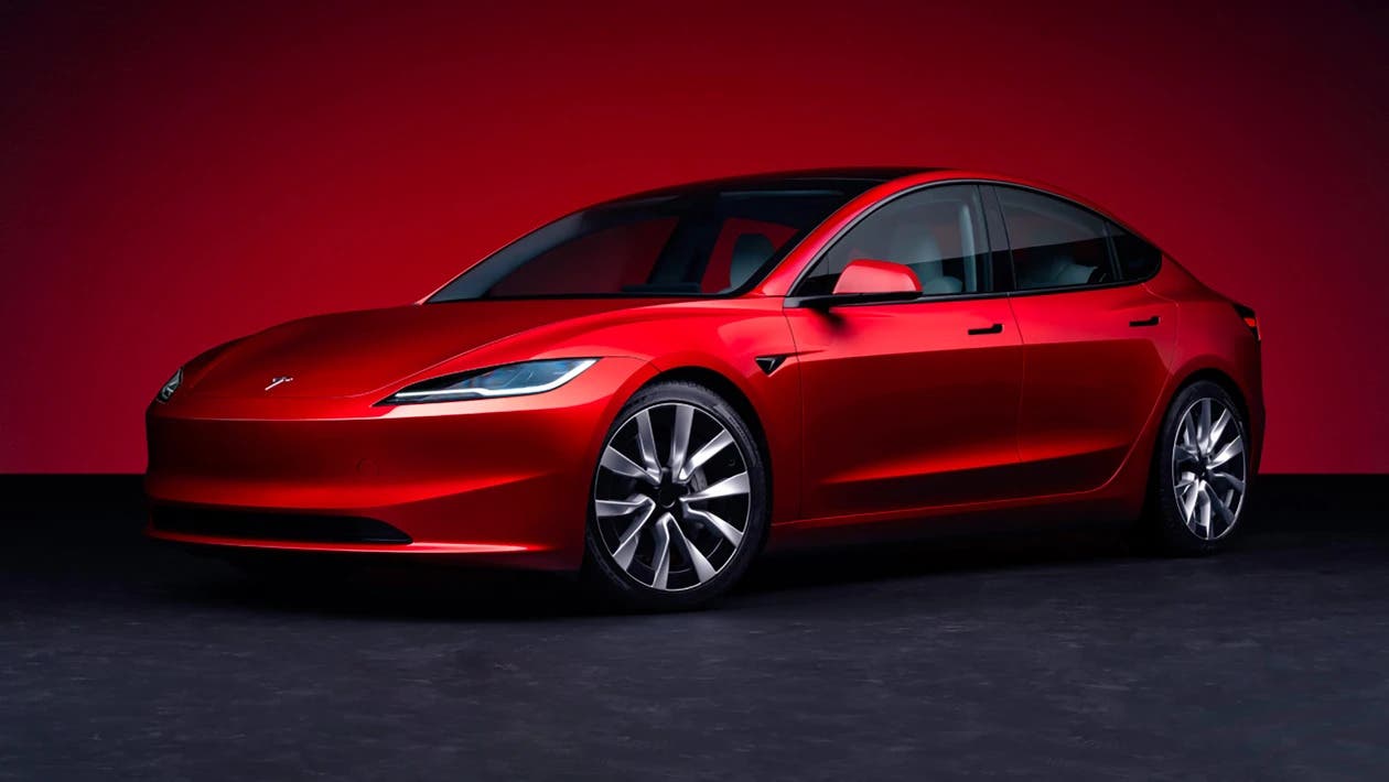 Facelifted Tesla Model 3 in red, front three quarter