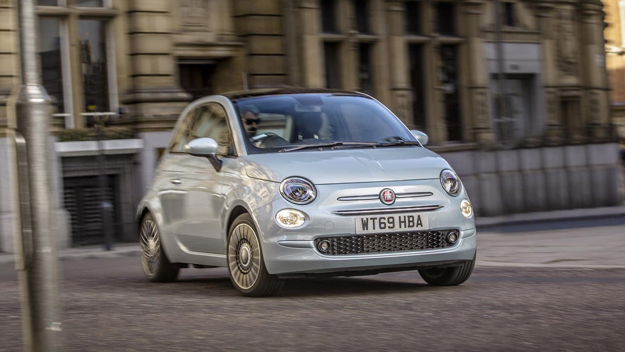 Fiat 500 in light blue, driving shot