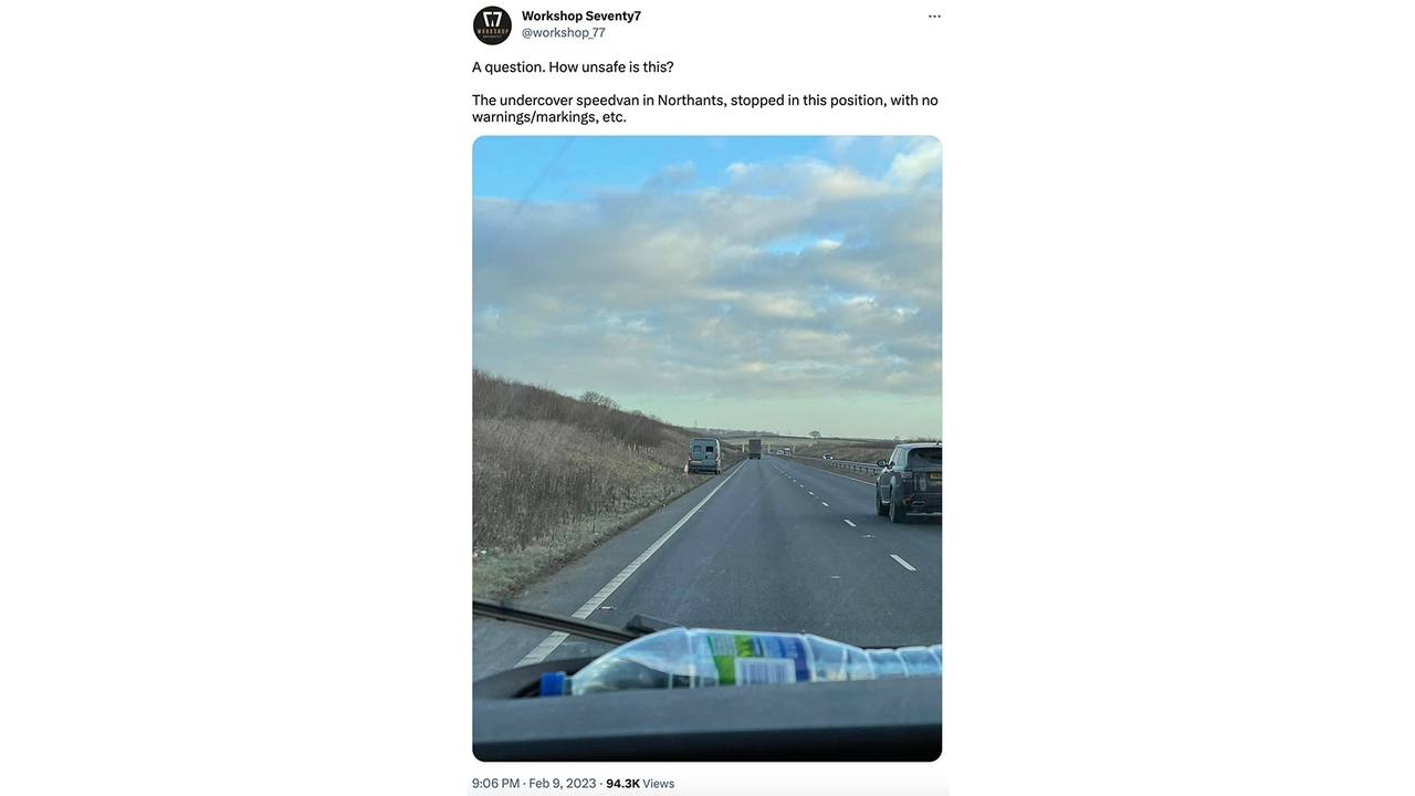 A screenshot of a tweet by Workshop Seventy7 showing a grey unmarked police speed van by the side of a two-lane dual carriageway