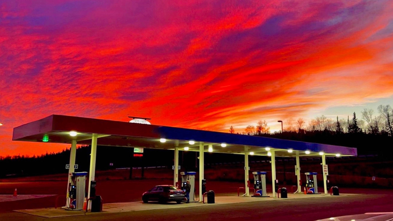 Petrol station in red-and-purple sunset