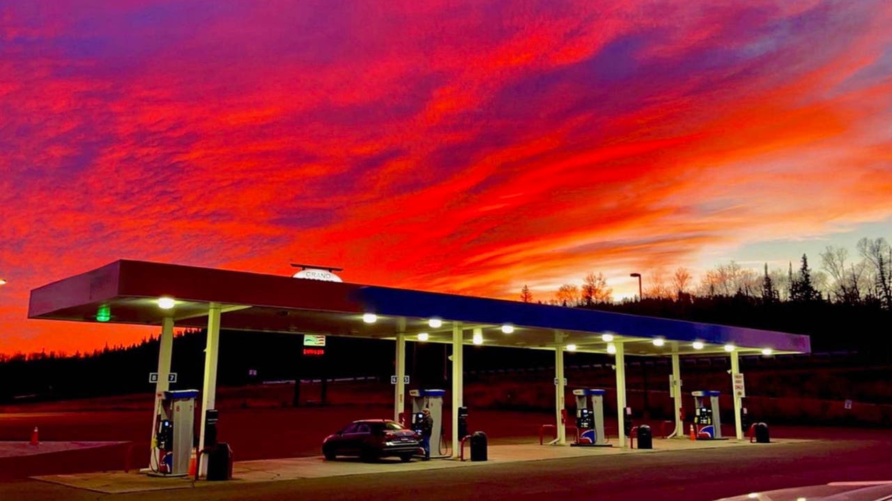 Petrol station in red-and-purple sunset