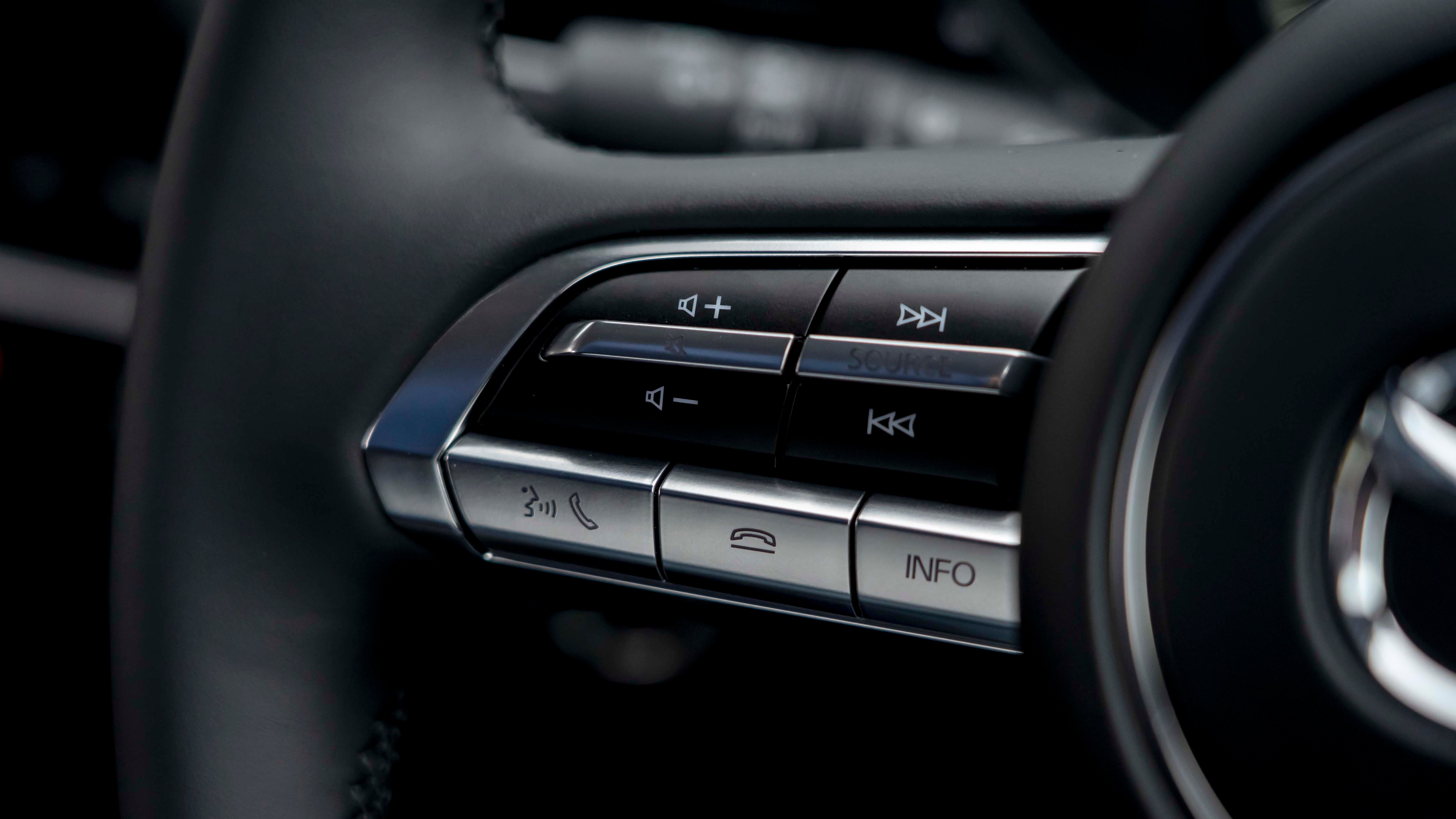Mazda 3 steering wheel buttons
