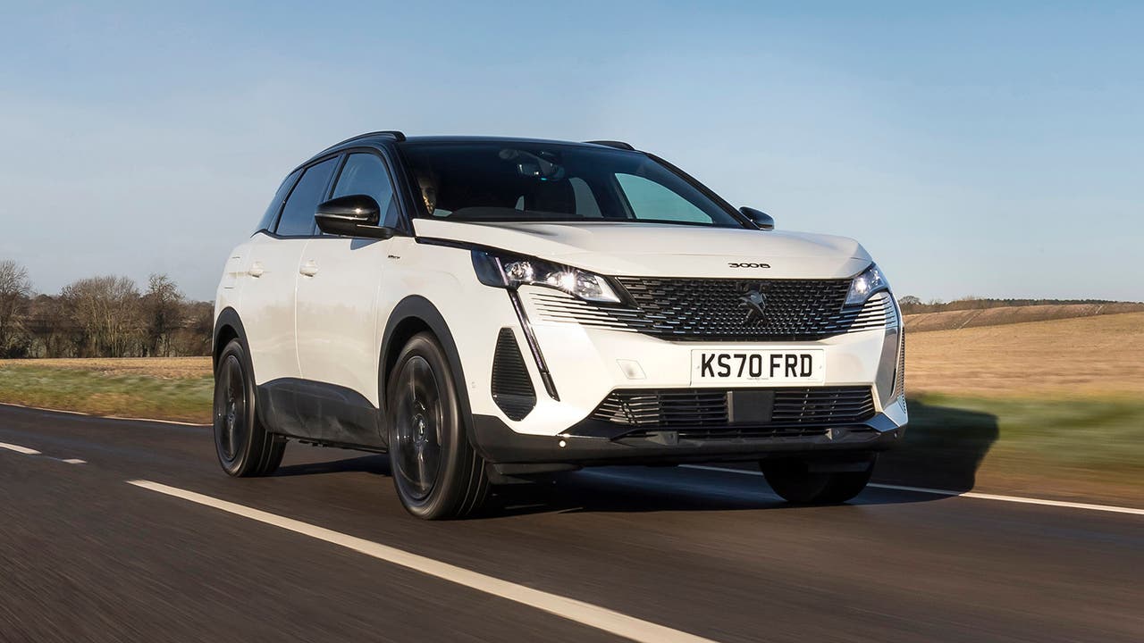 Peugeot 3008 in white, driving shot