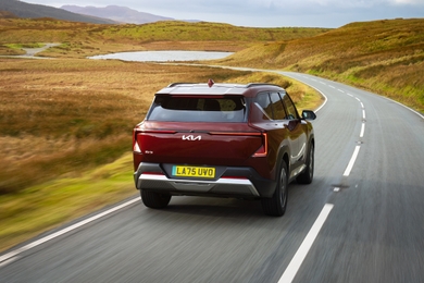 Kia ev5 driving rear