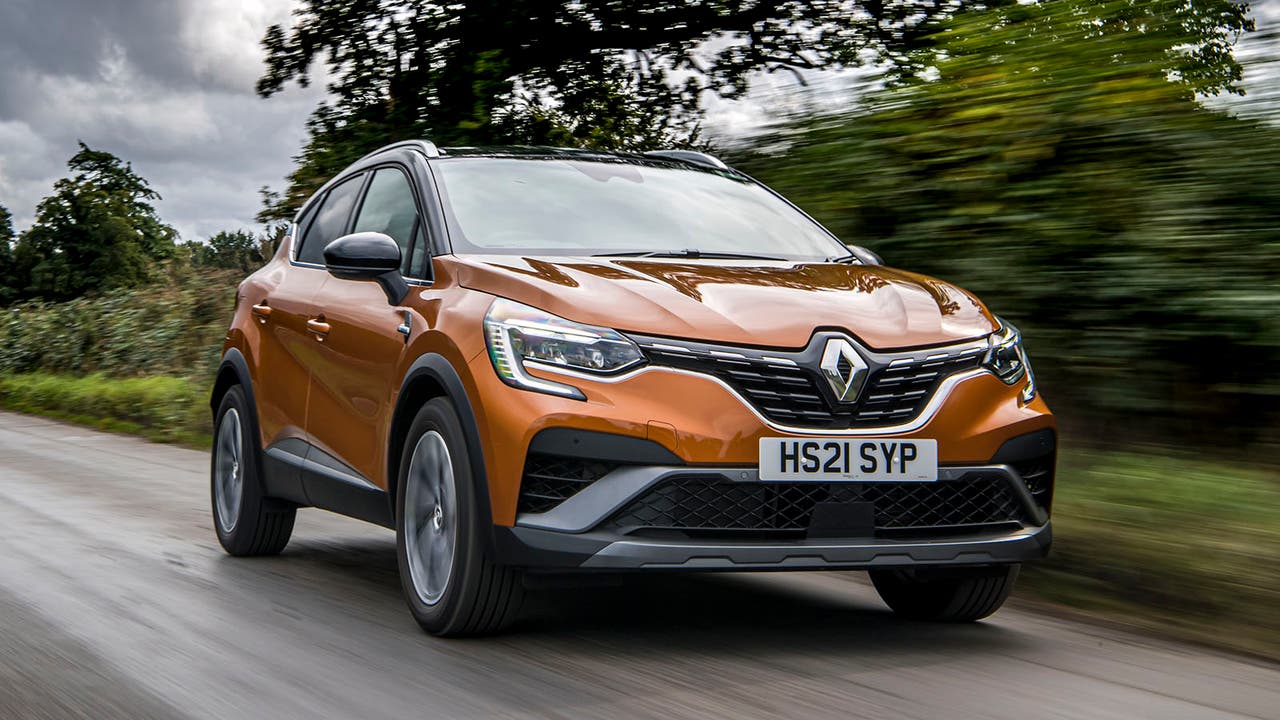 Renault Captur in orange, driving shot
