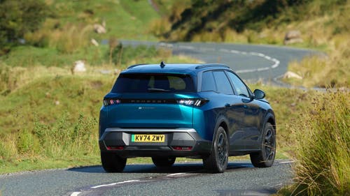 2024 Peugeot e-5008 driving rear view