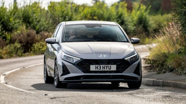 Silver Hyundai i20 driving