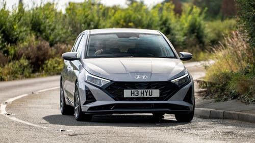 Silver Hyundai i20 driving