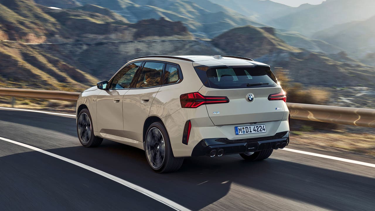 BMW X3 M50 in white rear three quarter