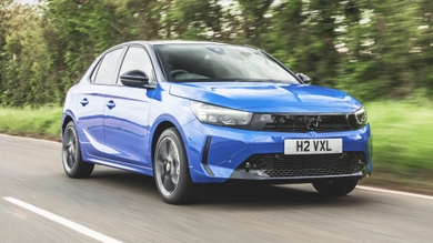 Blue Vauxhall Corsa Hybrid driving