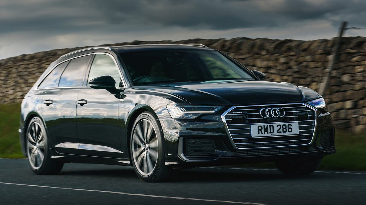 Audi A6 Avant in black, driving shot