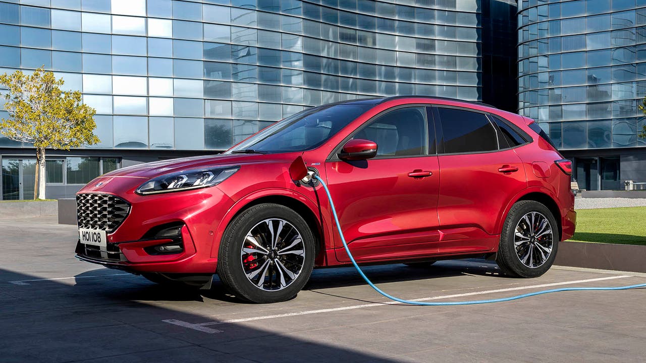 Ford Kuga plug-in hybrid PHEV in red, charging