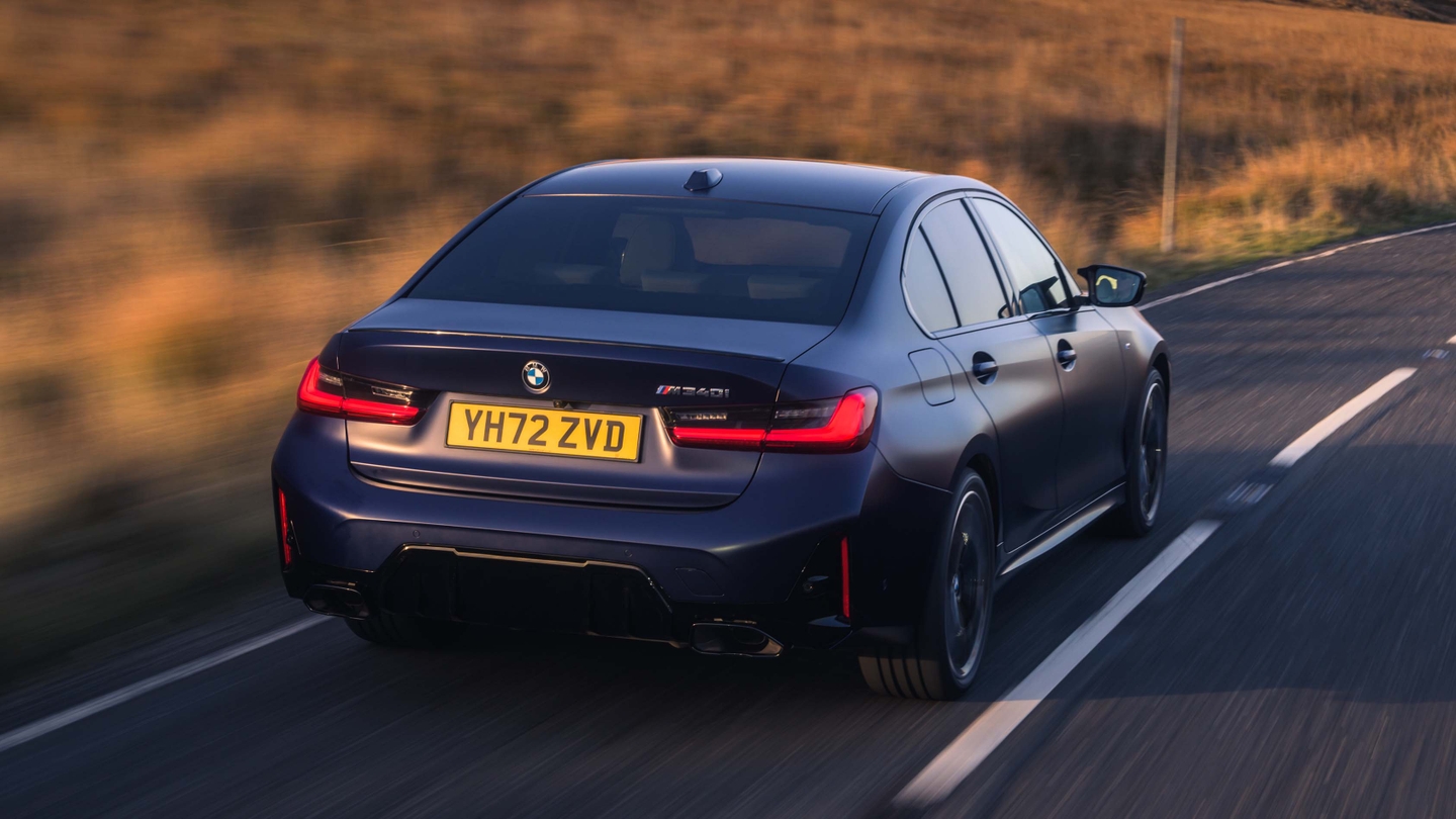 BMW 3 Series driving rear view