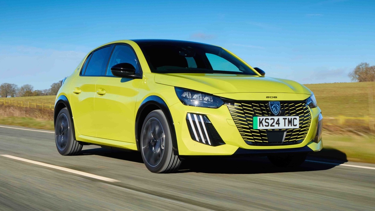 Yellow Peugeot e-208