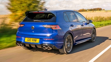 VW Golf R driving rear view