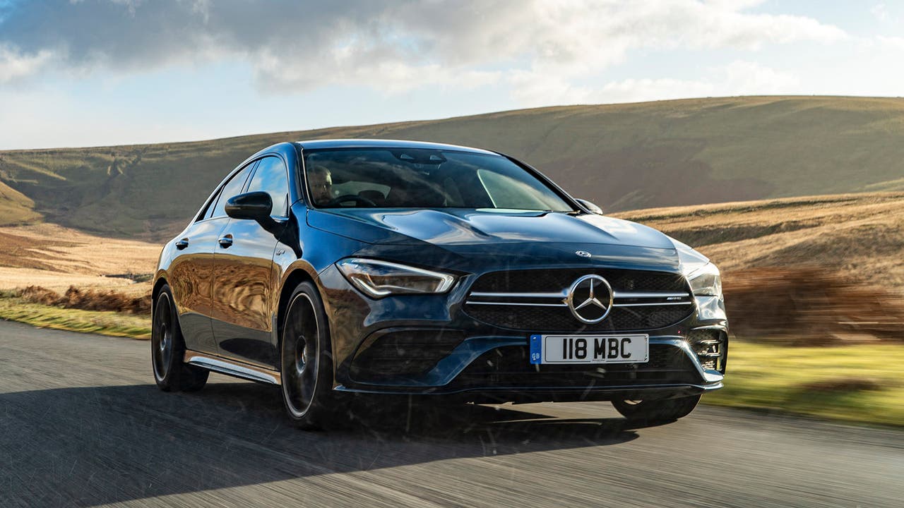 Mercedes CLA 35 AMG in dark blue, driving shot