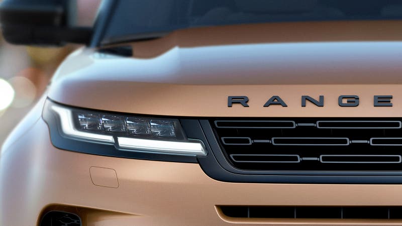 Range Rover Evoque headlight, front grille and badge detail shot