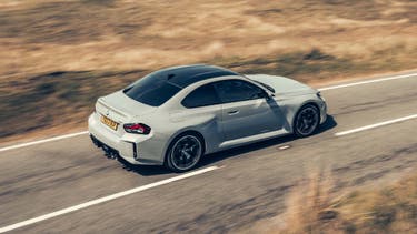 BMW M2 driving top/side view