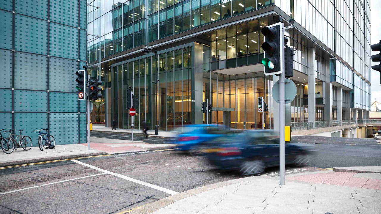 Timelapse of cars going through green traffic light