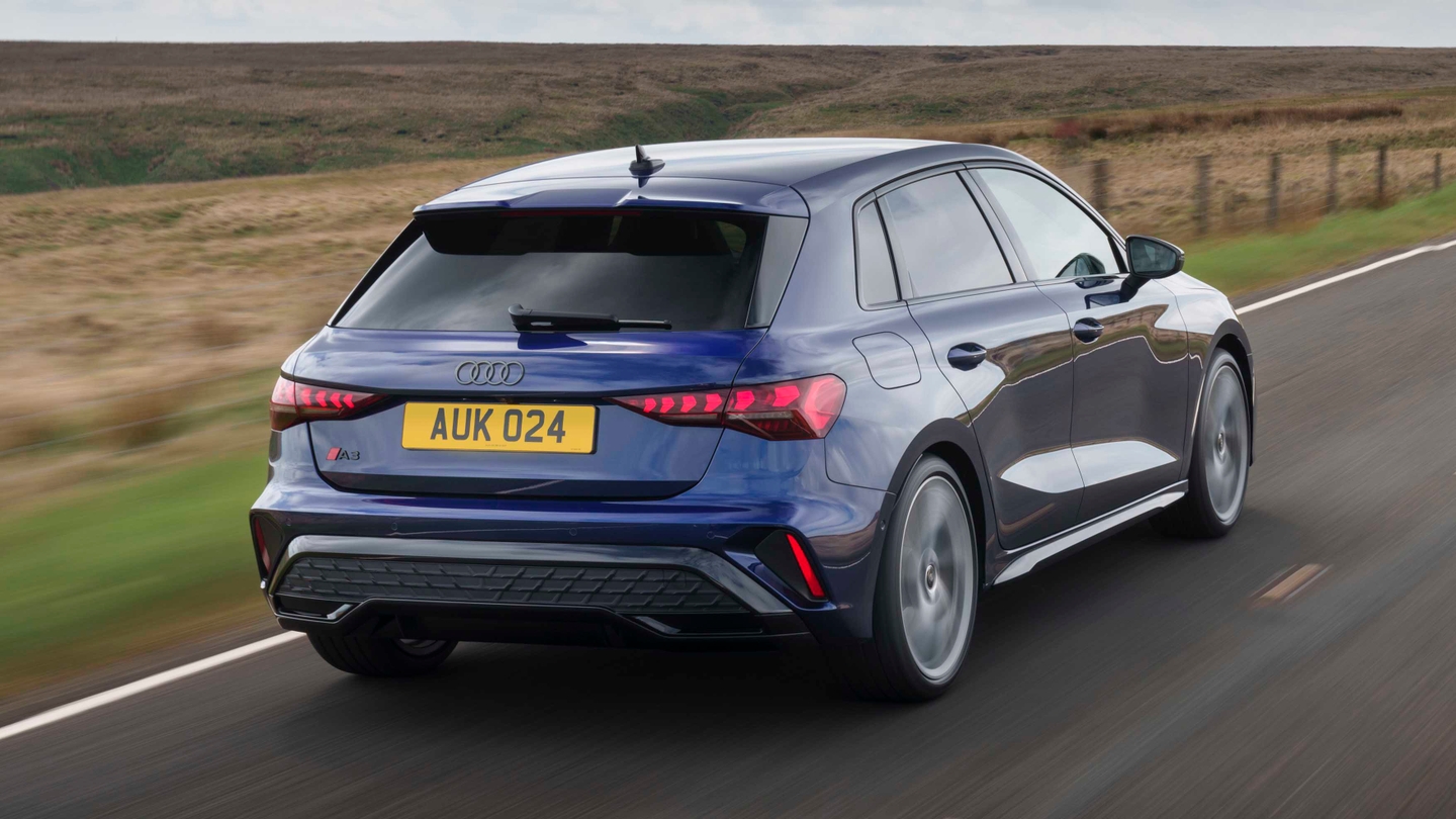 Audi A3 driving rear view