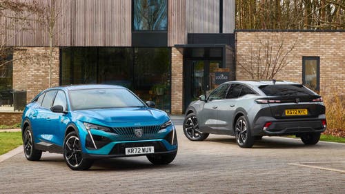 Peugeot 408 models parked near each other