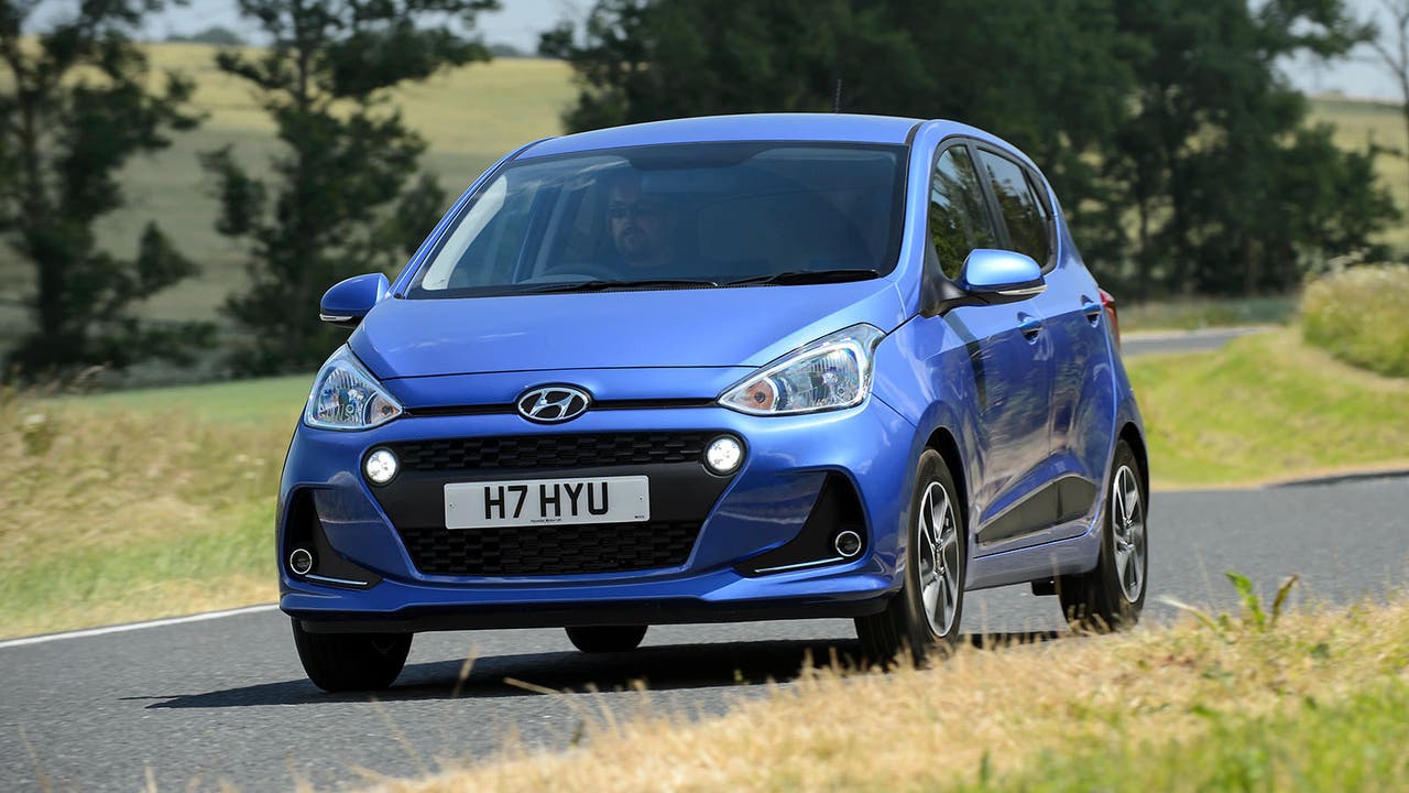 Hyundai i10 in blue, driving shot