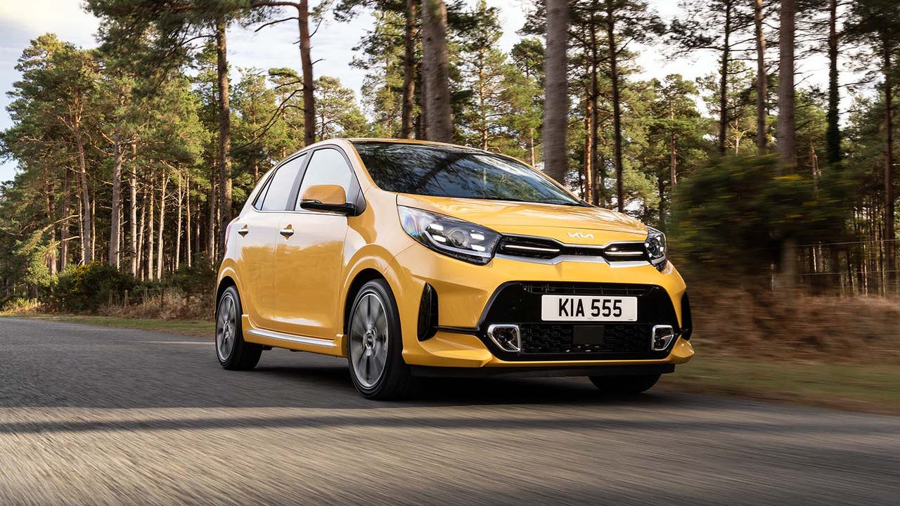 Kia Picanto in yellow, driving shot