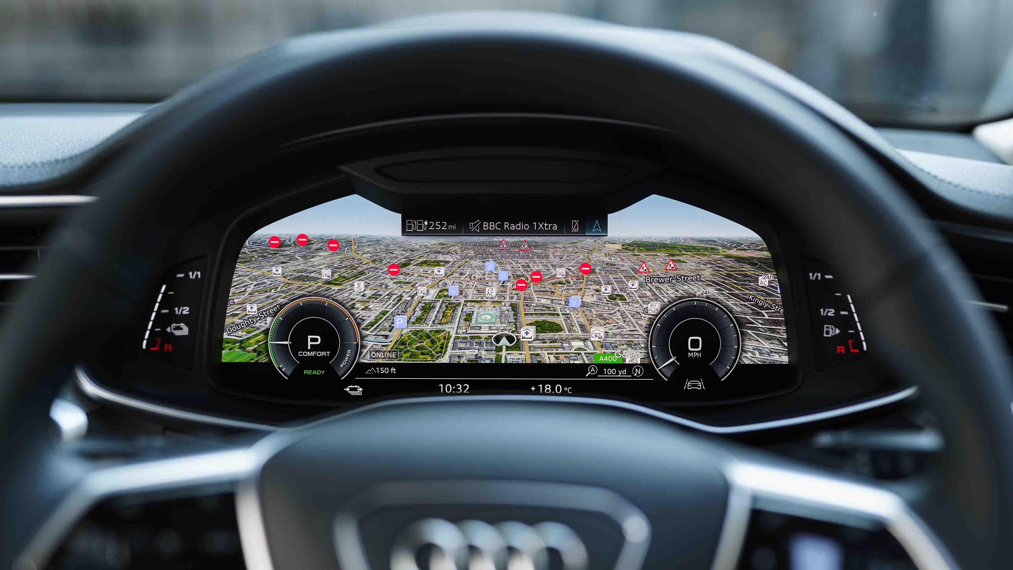Audi A6 Virtual Cockpit dials showing full-width sat nav display