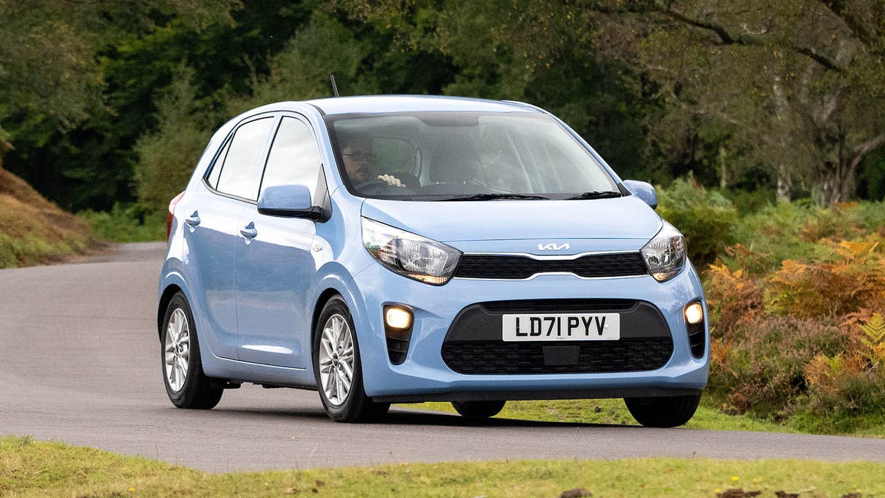 Kia Picanto in light blue, driving shot