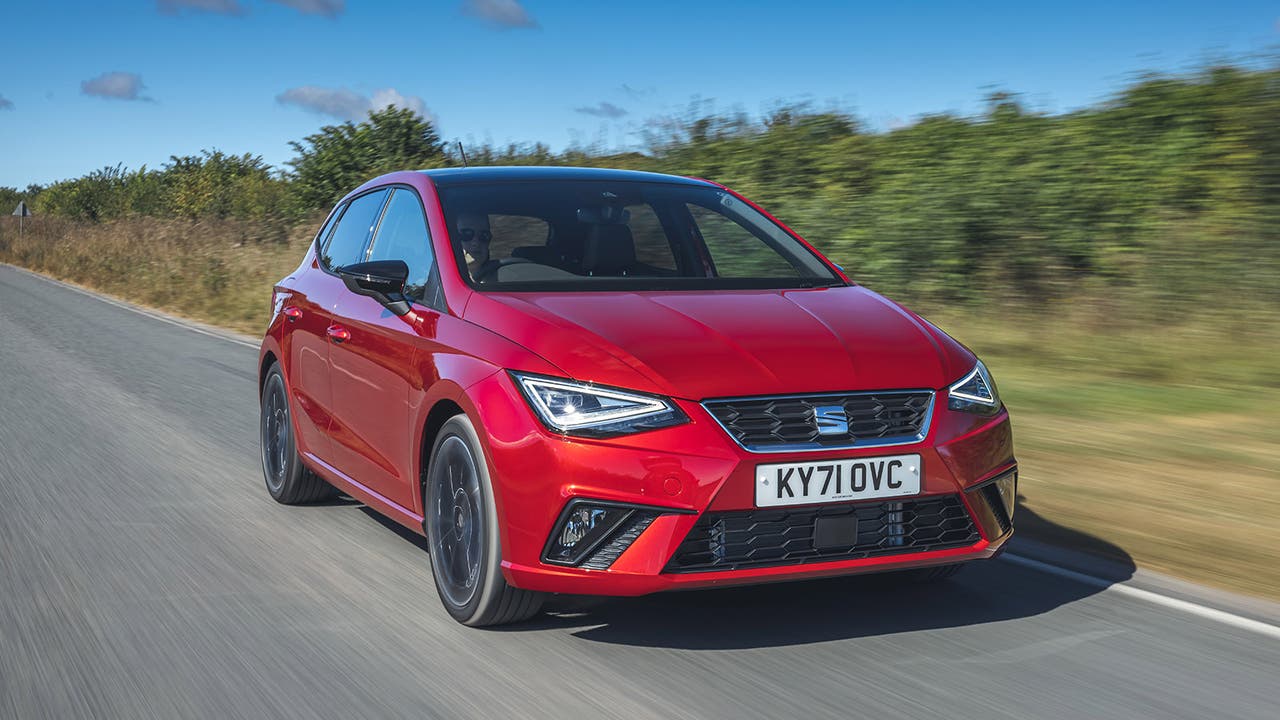 SEAT Ibiza in red, driving shot