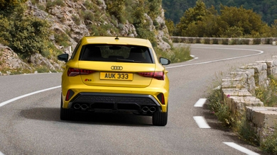 Audi S3 driving rear view