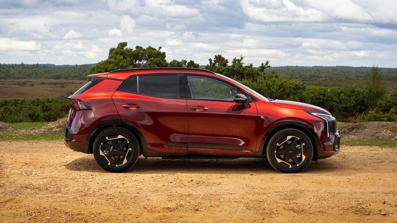 Kia Sportage in red, side static