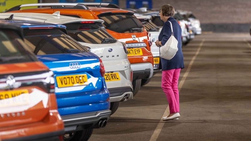 Lady looking at SUVs at Motorpoint Newport