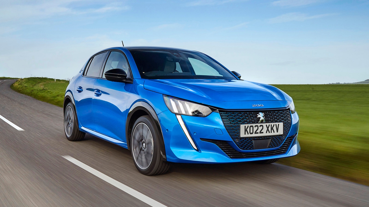 Peugeot 208 in blue, driving shot