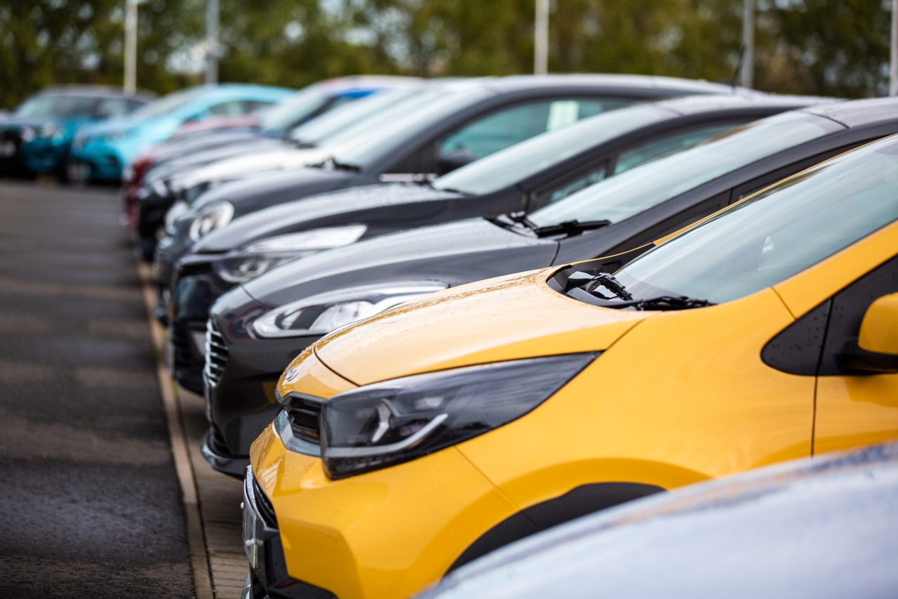 Line up of cars on a dealer forecourt